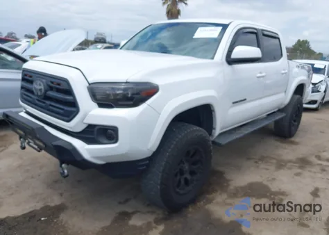 2018 Toyota Tacoma Sr5 V6 z USA, uszkodzony, nr VIN 3TMAZ5CN4JM077421